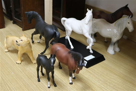 Six Beswick models of horses and a Beswick Lion